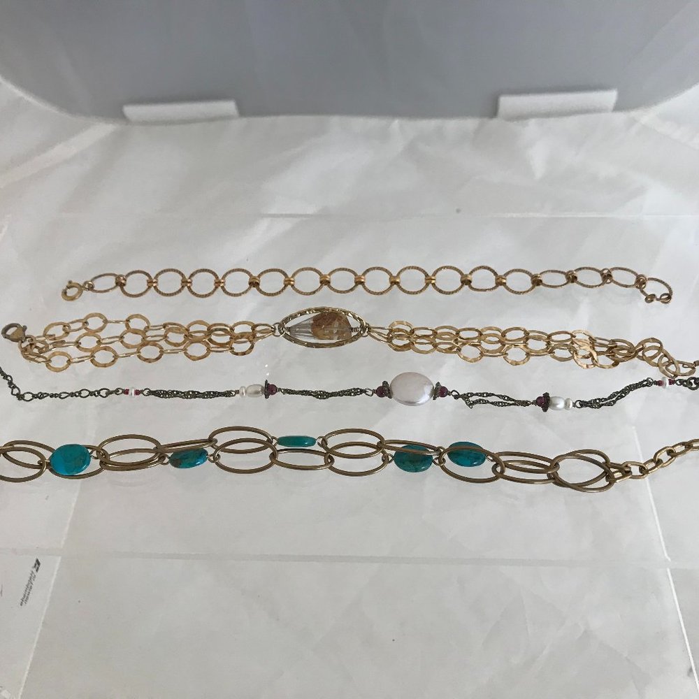 4 gold plated bracelets with semi-precious stones